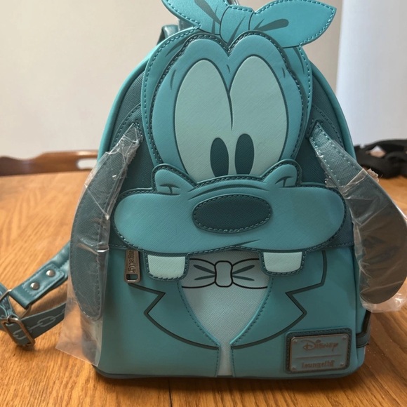 Loungefly Handbags - Loungefly Disney Christmas Carol  Goofy Mini Backpack